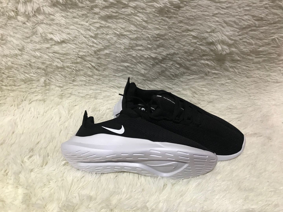 Nike Low-Top Sneakers in Black and White Knit - product image from the listing.