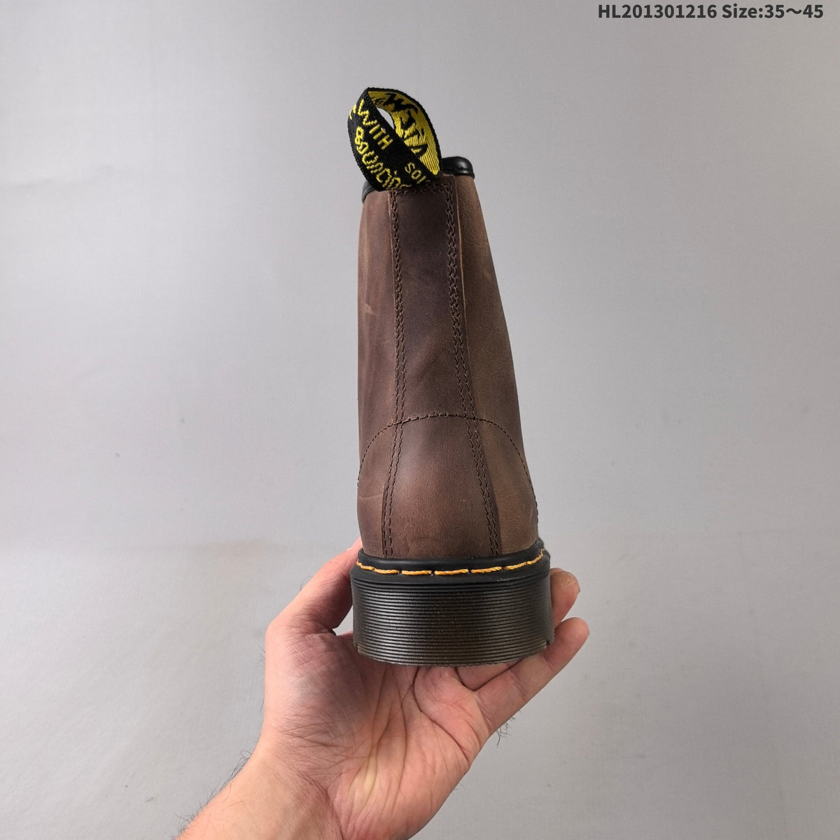 1460 Brown Platform Lace-Up Boots by Dr. Martens - product image from the listing.