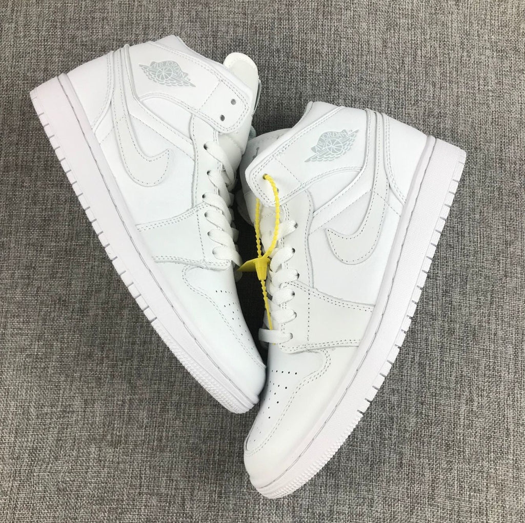 Air Jordan 1 Mid Sneakers in White - product image from the listing.