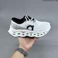 On Cloudmonster 3 Running Shoes in White Black - product image from the listing.