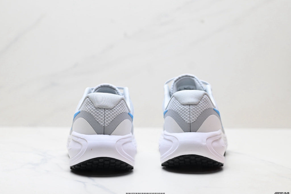 Nike Revolution 8 Running Shoes, in White and Blue - product image from the listing.