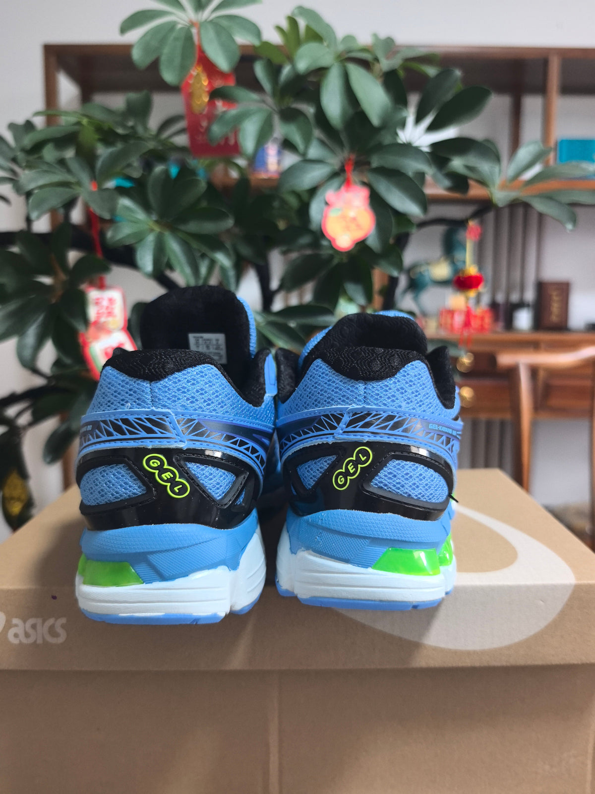 ASICS GEL-KAYANO 14 Sneakers in Blue and Black - product image from the listing.