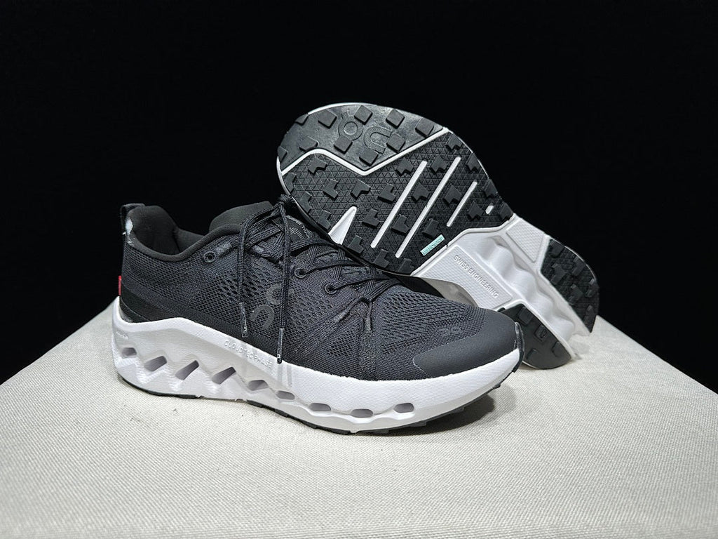 On Cloudsurfer Trail Trail Running Shoes in Black and White - product image from the listing.