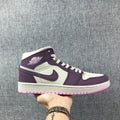 Air Jordan 1 Mid Sneakers in Pink Purple 555112-500 - product image from the listing.