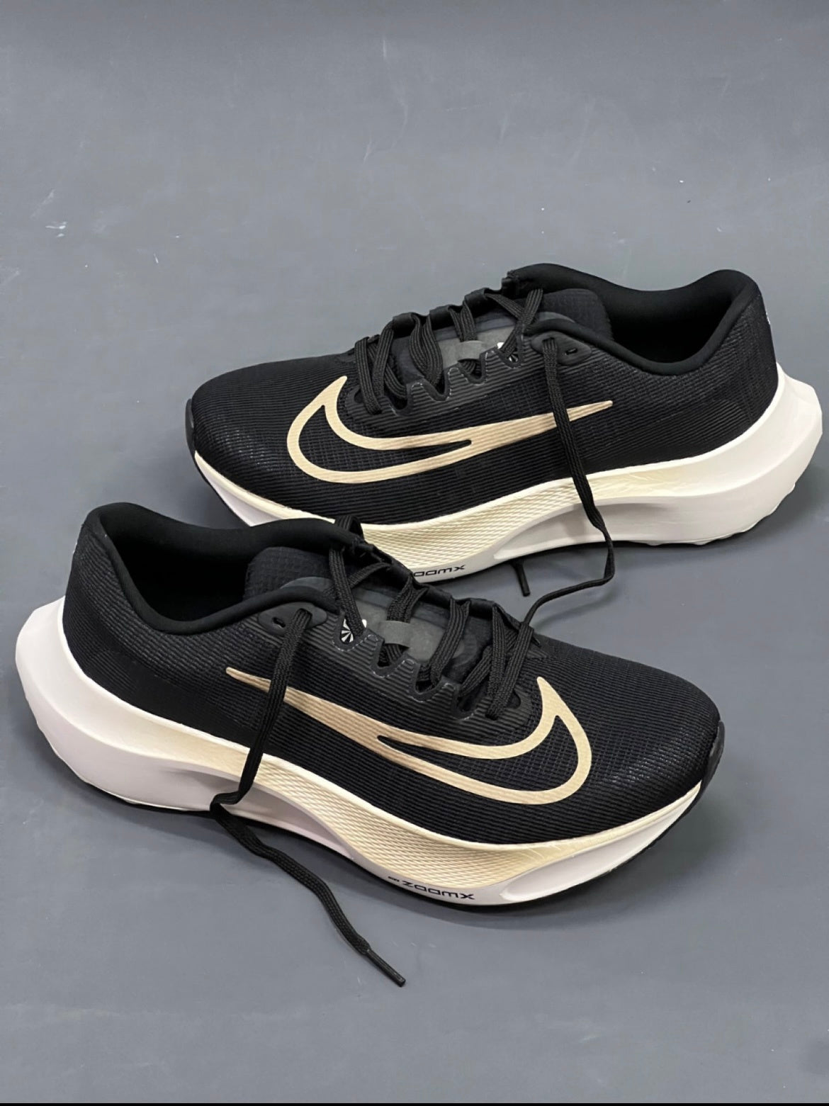 Nike Zoom Fly 5 Running Shoes in Black Gold DM8968-002 - product image from the listing.