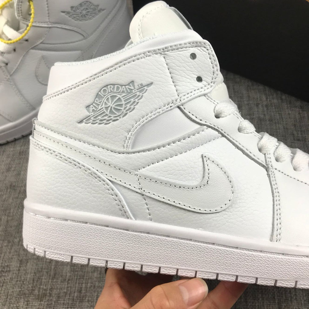 Air Jordan 1 Mid Sneakers in White - product image from the listing.
