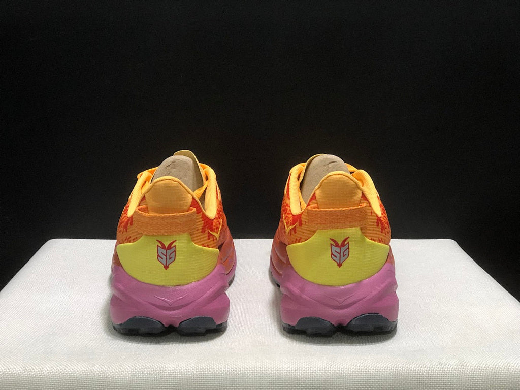 HOKA Speedgoat 6 Trail Running Shoes, in Orange and Yellow - product image from the listing.