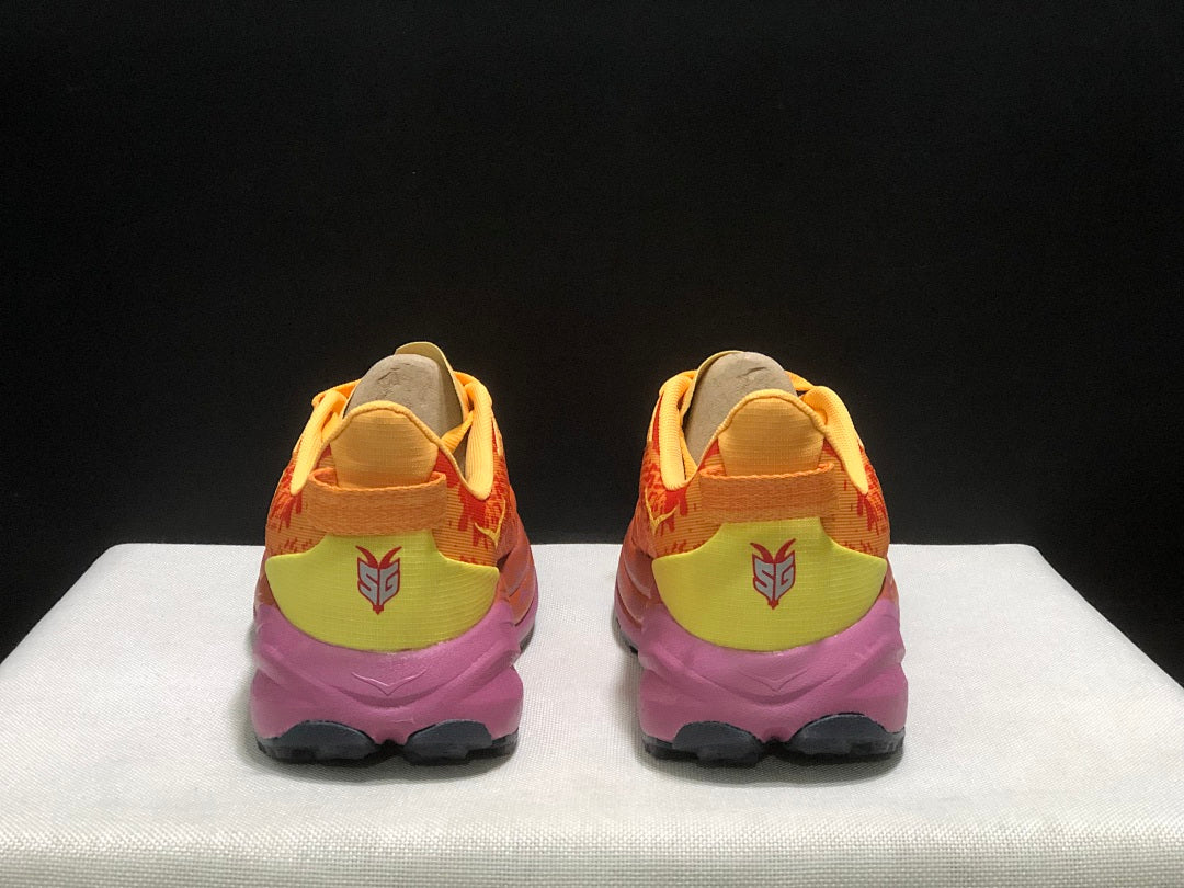HOKA Speedgoat 6 Trail Running Shoes, in Orange and Yellow - product image from the listing.