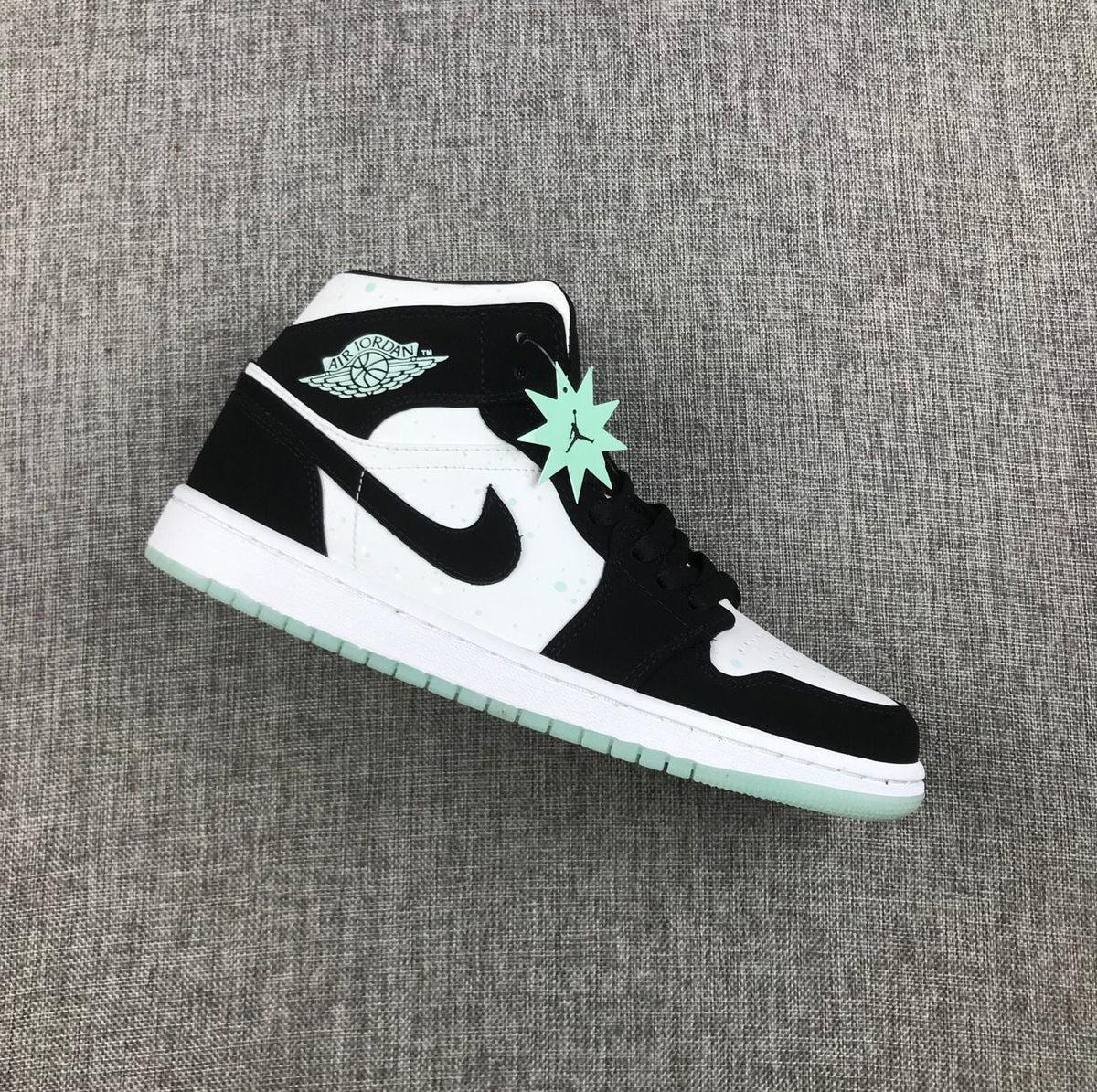Air Jordan 1 Mid Sneakers in Black White Mint BQ6931-103 - product image from the listing.