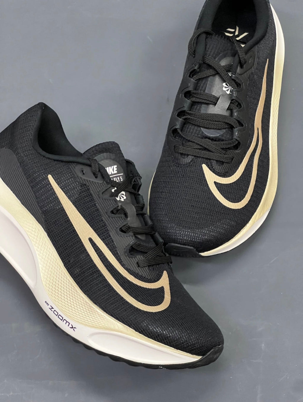 Nike Zoom Fly 5 Running Shoes in Black Gold DM8968-002 - product image from the listing.