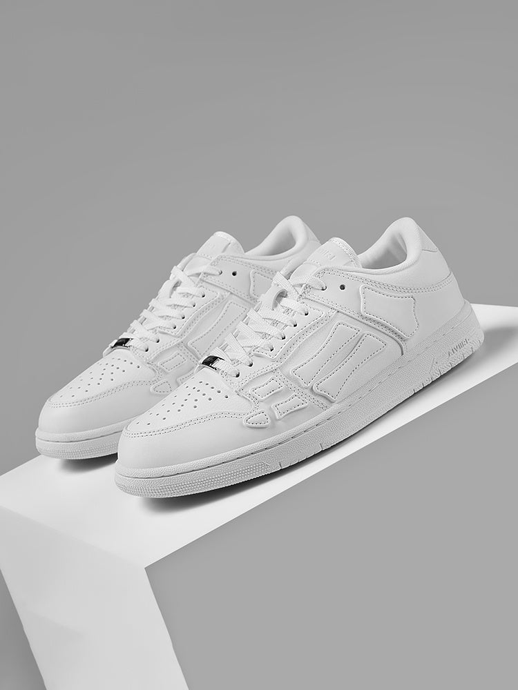 AMIRI Low-Top Sneakers in White Bone MFS003-194 - product image from the listing.
