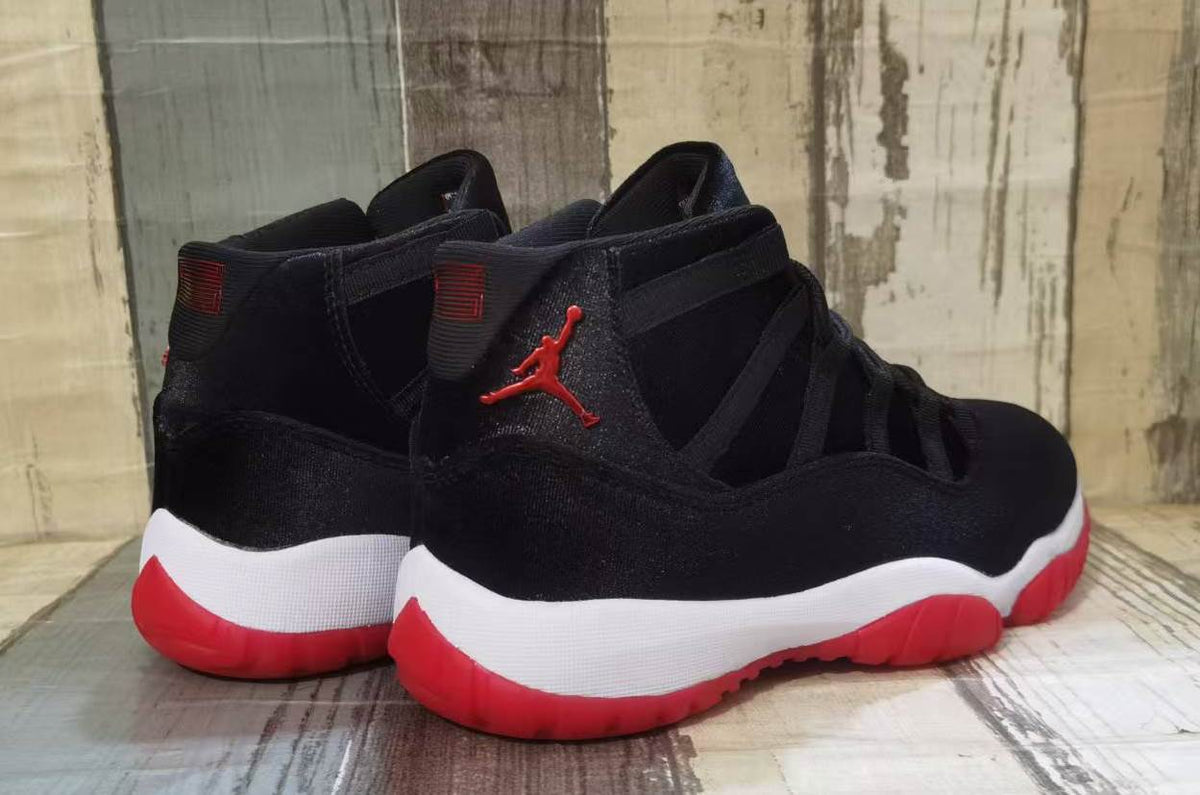 "72-10" Air Jordan 11 Retro Black/Red Velvet - product image from the listing.