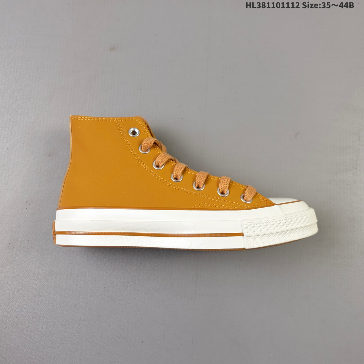 Converse Chuck 70 High Top Trainers in Mustard - product image from the listing.