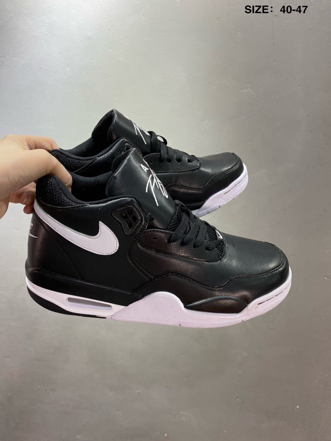 Nike Air Flight 89 Sneakers in Black and White - product image from the listing.