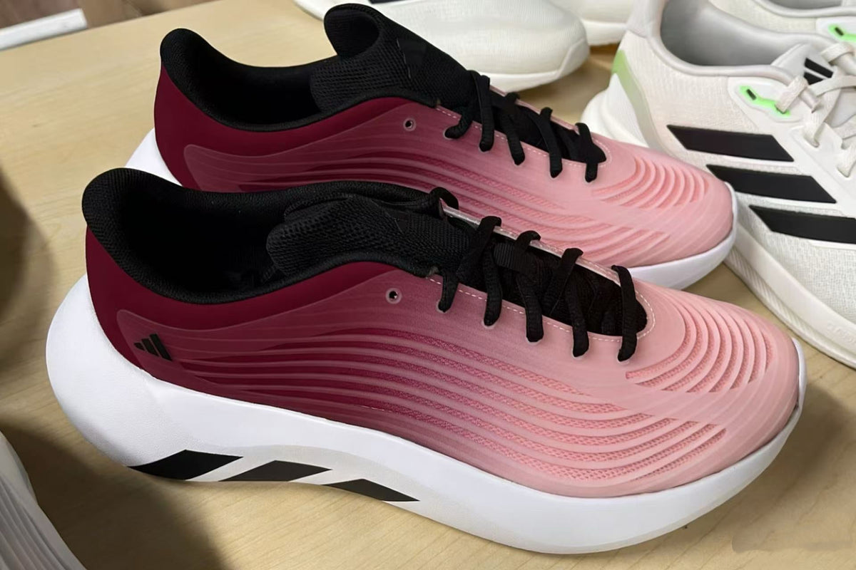 Pink and Burgundy Lace-Up Trainers with White Sole - product image from the listing.