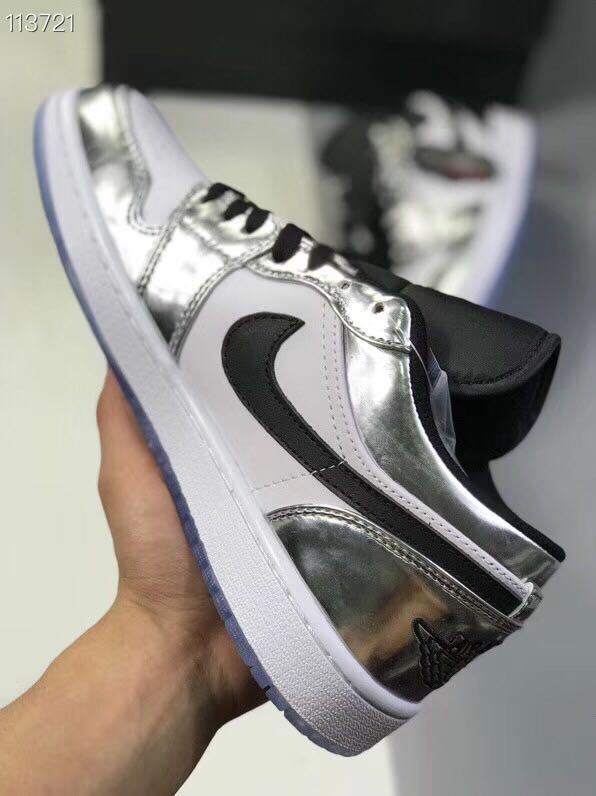 Jordan 1 Low Leonard Sneakers in Silver and White - product image from the listing.