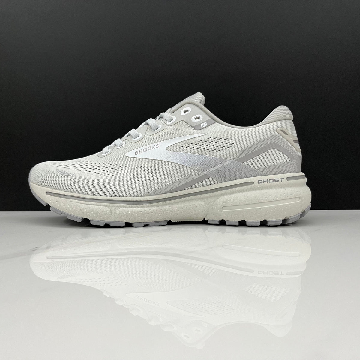 White and Grey Brooks Ghost 15 Running Shoes - product image from the listing.