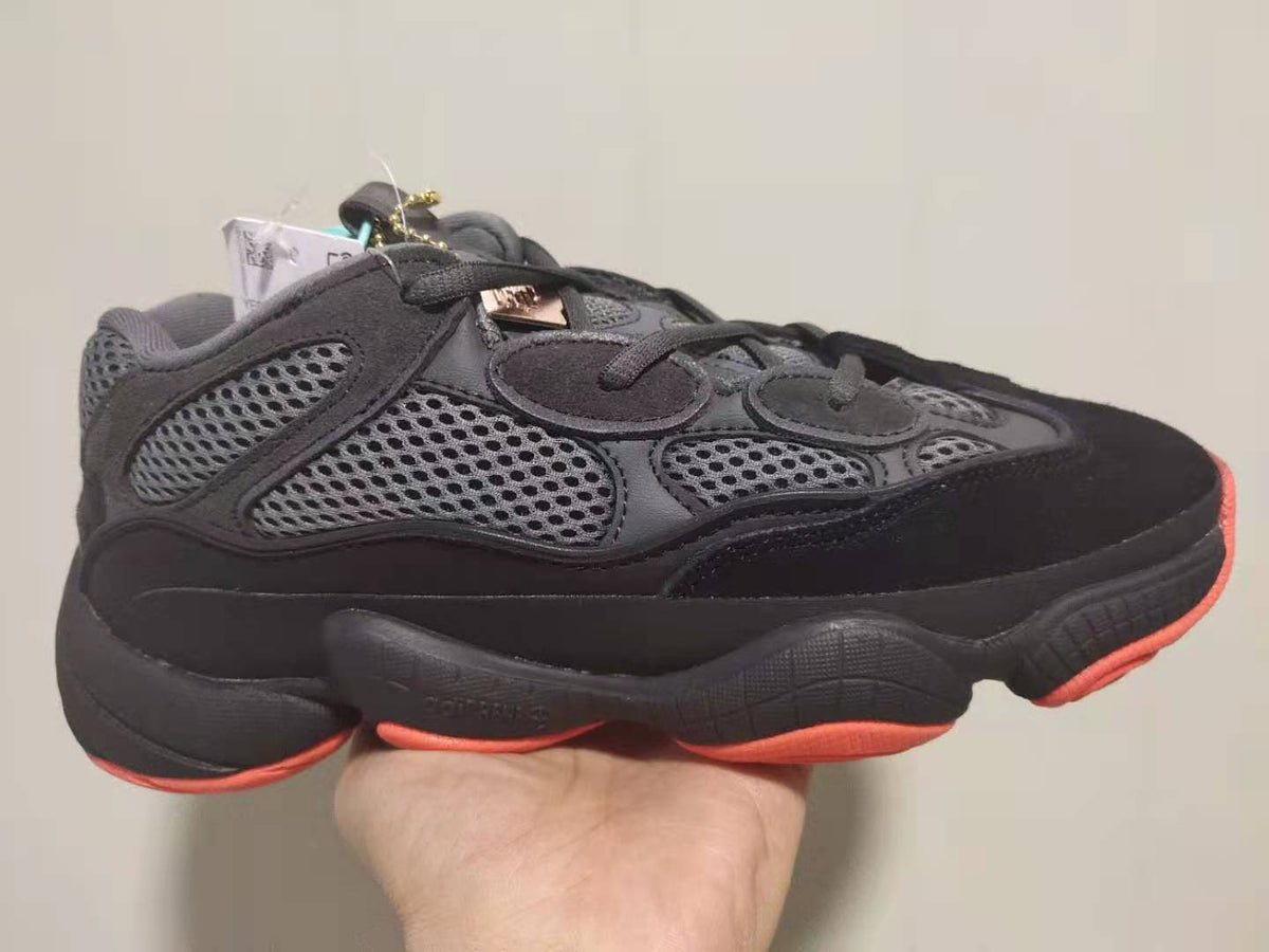 Yeezy 500 Sneakers in Black Orange FW7108 - product image from the listing.