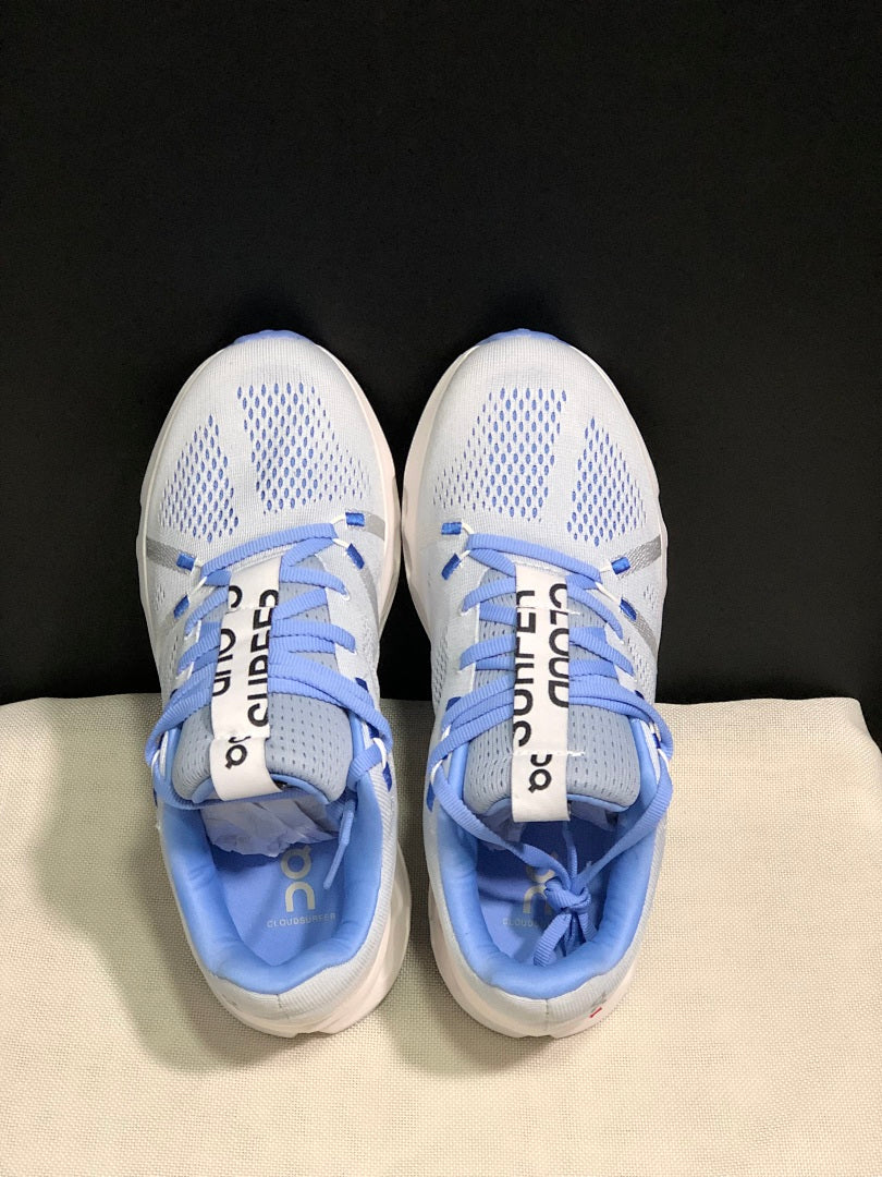 On Cloudsurfer Running Shoes, Heather in White and Blue - product image from the listing.