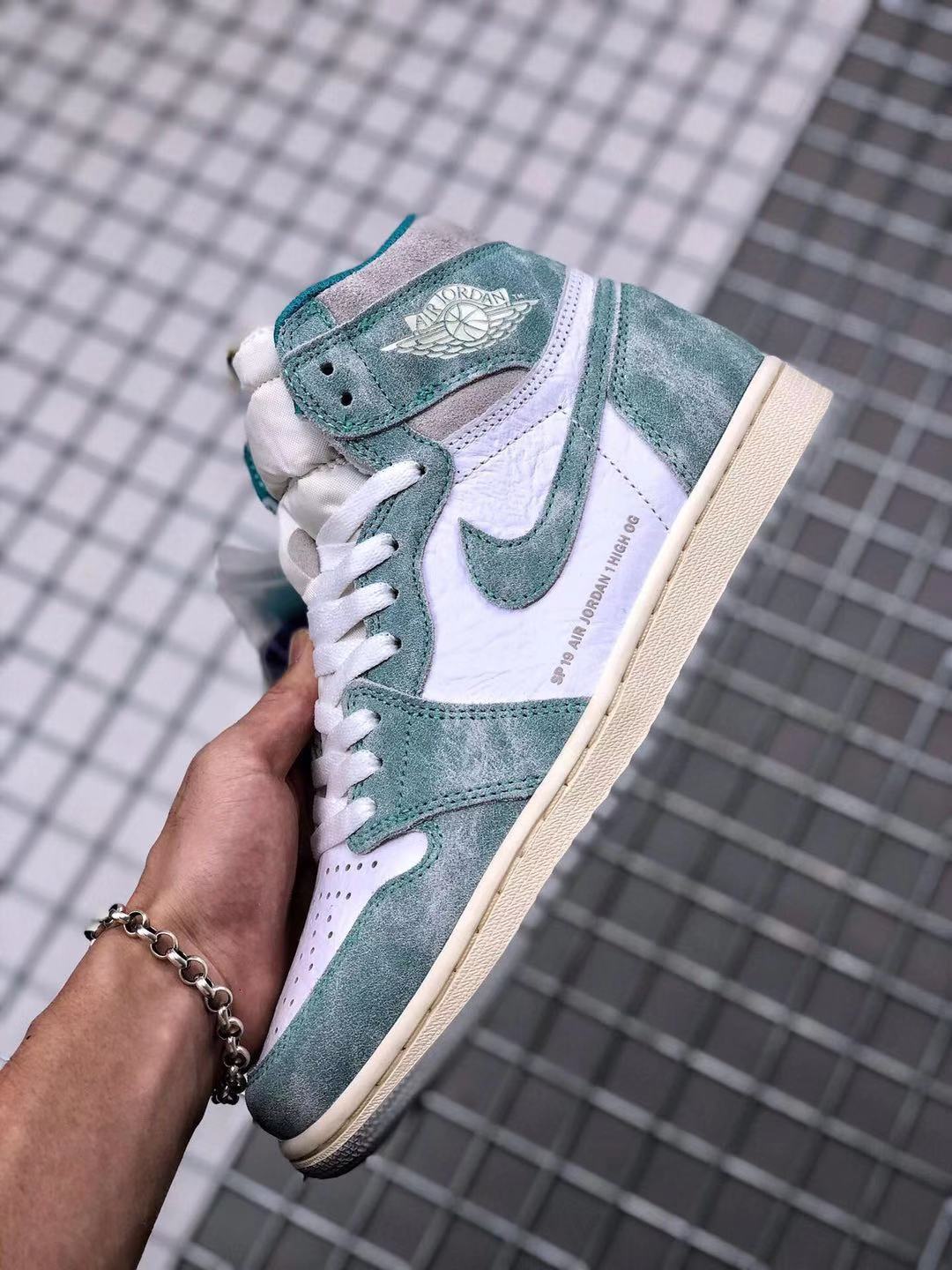 Air Jordan 1 High OG Teal and White Sneakers - product image from the listing.