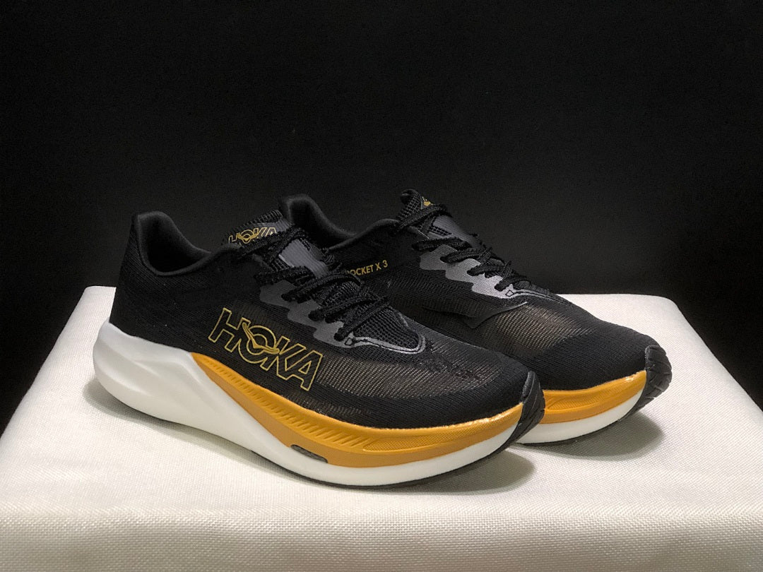 Black and Gold HOKA Rocket X 3 Running Shoes - product image from the listing.