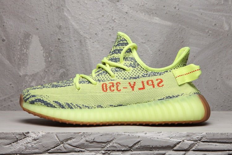 Lime Green and Brown Yeezy Boost 350 V2 Sneakers - product image from the listing.