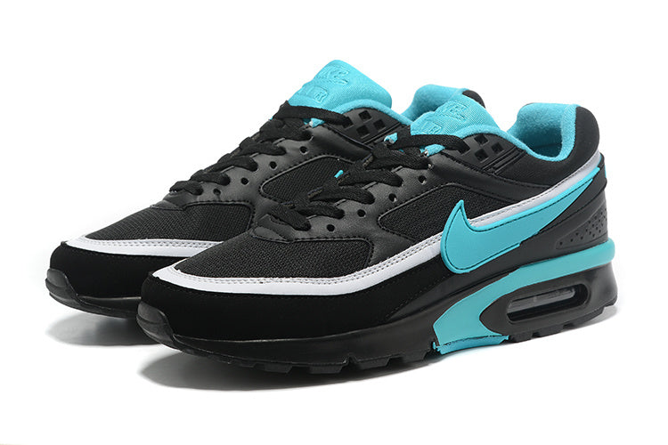 Nike Air Max Sneakers in Black and Turquoise - product image from the listing.