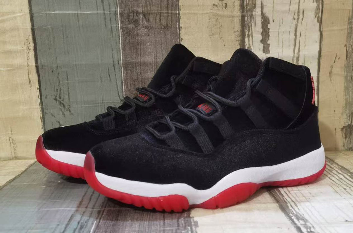 "72-10" Air Jordan 11 Retro Black/Red Velvet - product image from the listing.