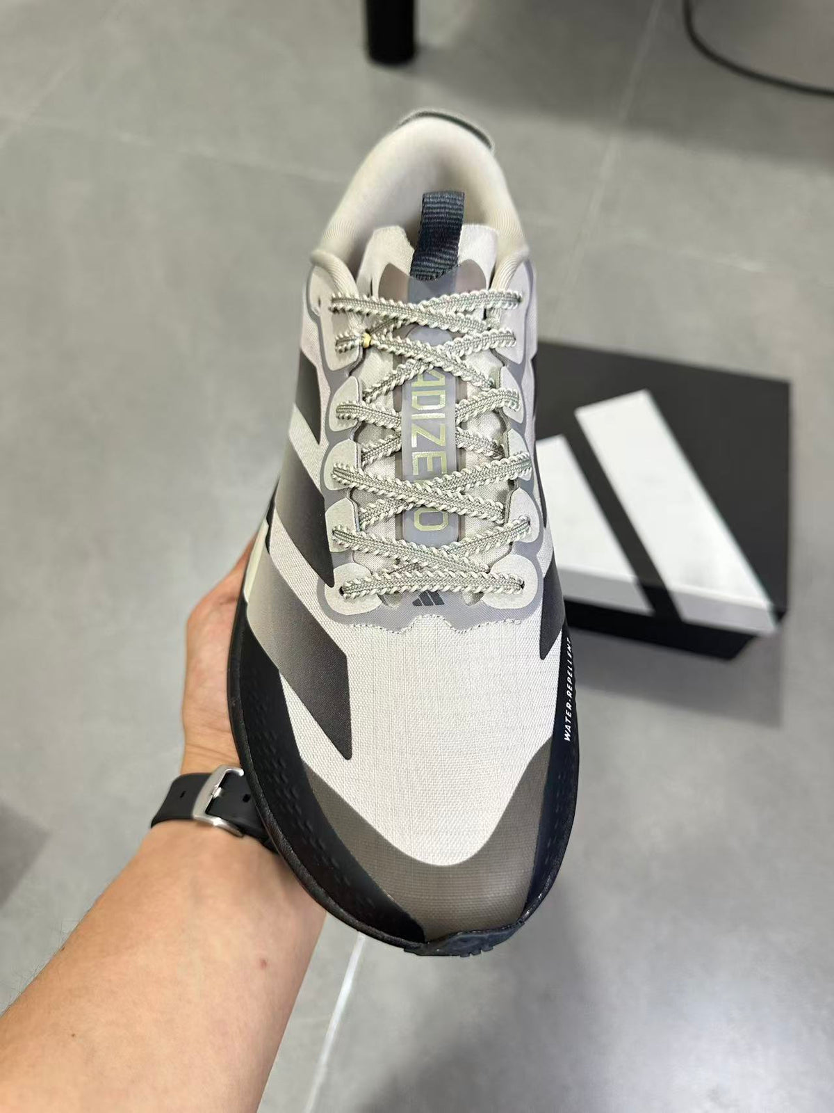 Adizero SL ATR Running Shoes in Black Brown KK0309 - product image from the listing.
