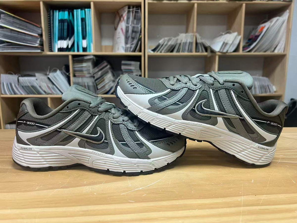 Nike P-9000 Trainers in Charcoal and Grey, IZ4752-300 - product image from the listing.