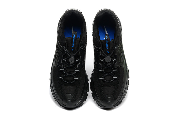 Nike Black Trail-Style Trainers - product image from the listing.