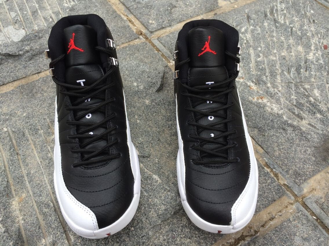 Women's Air Jordan 12 High-Top Sneakers, Black and White - product image from the listing.