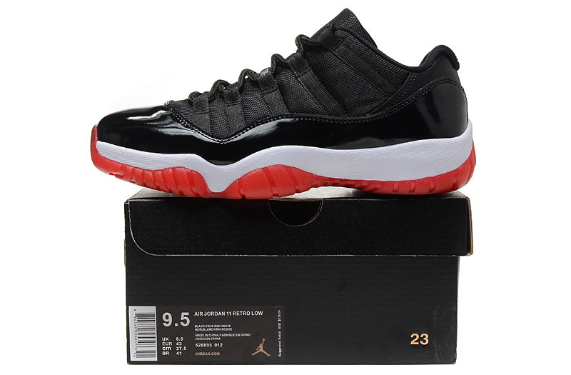 Air Jordan 11 Retro Low Black and Red Sneakers - product image from the listing.