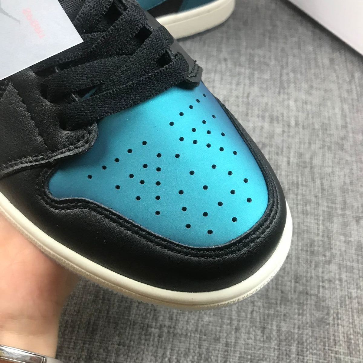Air Jordan 1 Mid BQ6472-009 Sneakers in Black and Turquoise - product image from the listing.