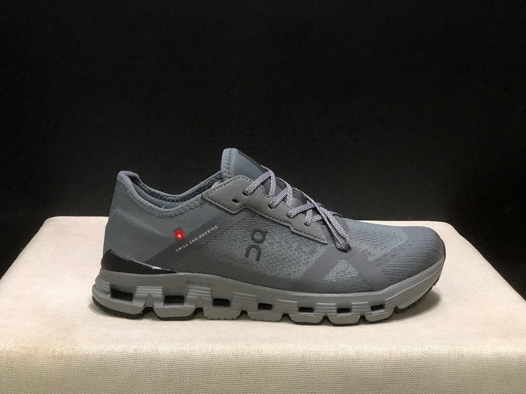 Gray and Black On Cloud X 4 AD Sneakers - product image from the listing.