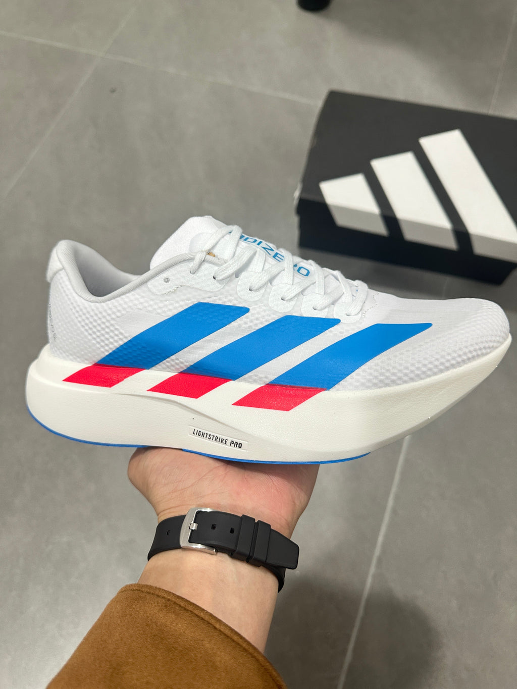 Adidas Lightstrike Pro Running Shoes in White Blue Red KJ3596 - product image from the listing.