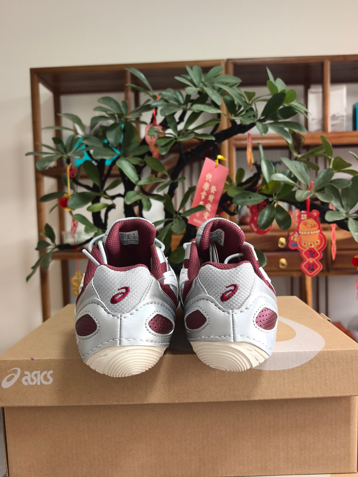 Silver and Red ASICS F2 Sneakers - product image from the listing.