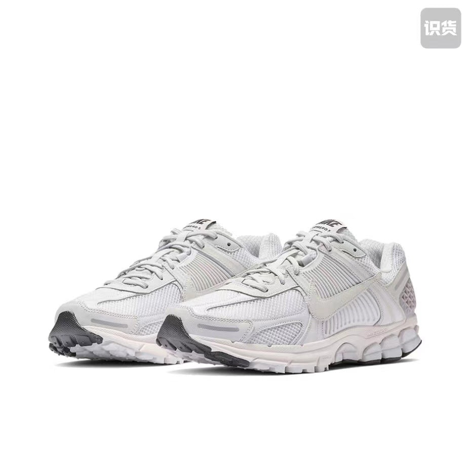 Nike Zoom Vomero 5 Sneakers in Grey and White - product image from the listing.