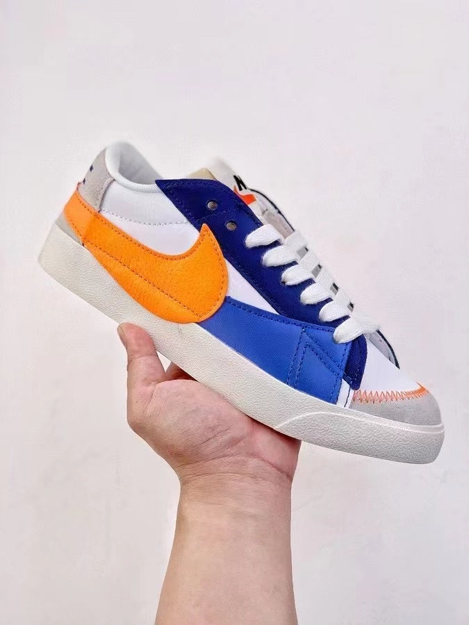 Nike Blazer Low 77 Sneakers in White Blue Orange - product image from the listing.