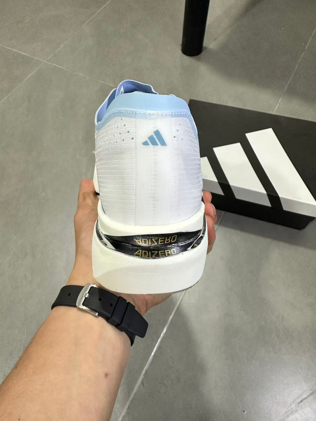 adidas Lightstrike Pro Running Shoes in White Blue KI8298 - product image from the listing.