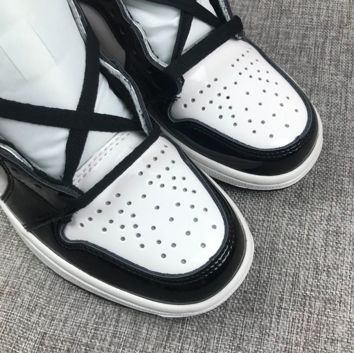 Air Jordan 1 Mid Sneakers in Black White Metallic Gold 852542-007 - product image from the listing.