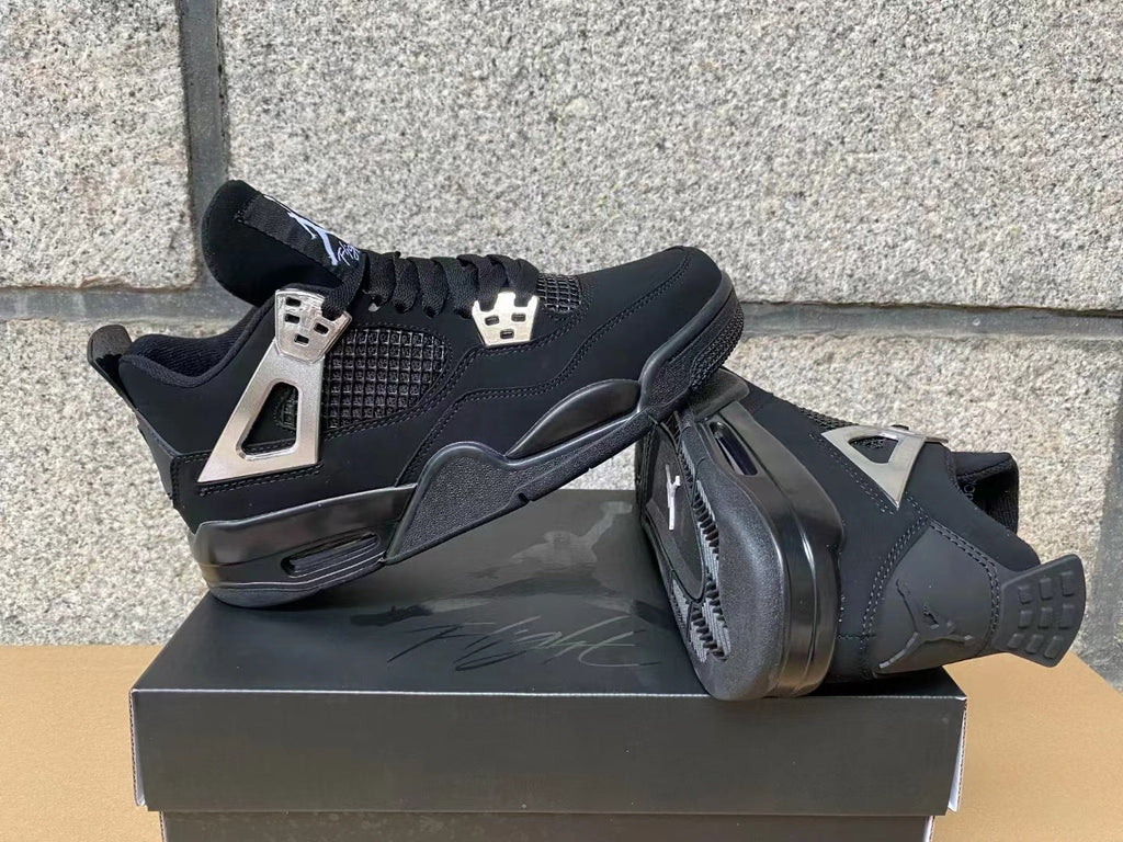 "Black Cat" Air Jordan 4 Sneakers - Chrome Silver - product image from the listing.