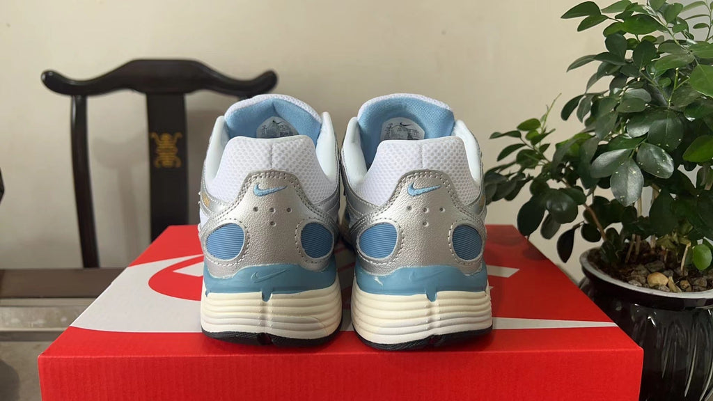 Nike P-6000 Sneakers in White Grey Blue HJ7246-100 - product image from the listing.