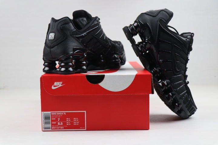 Black and Gold Nike Shox TL Sneakers - product image from the listing.