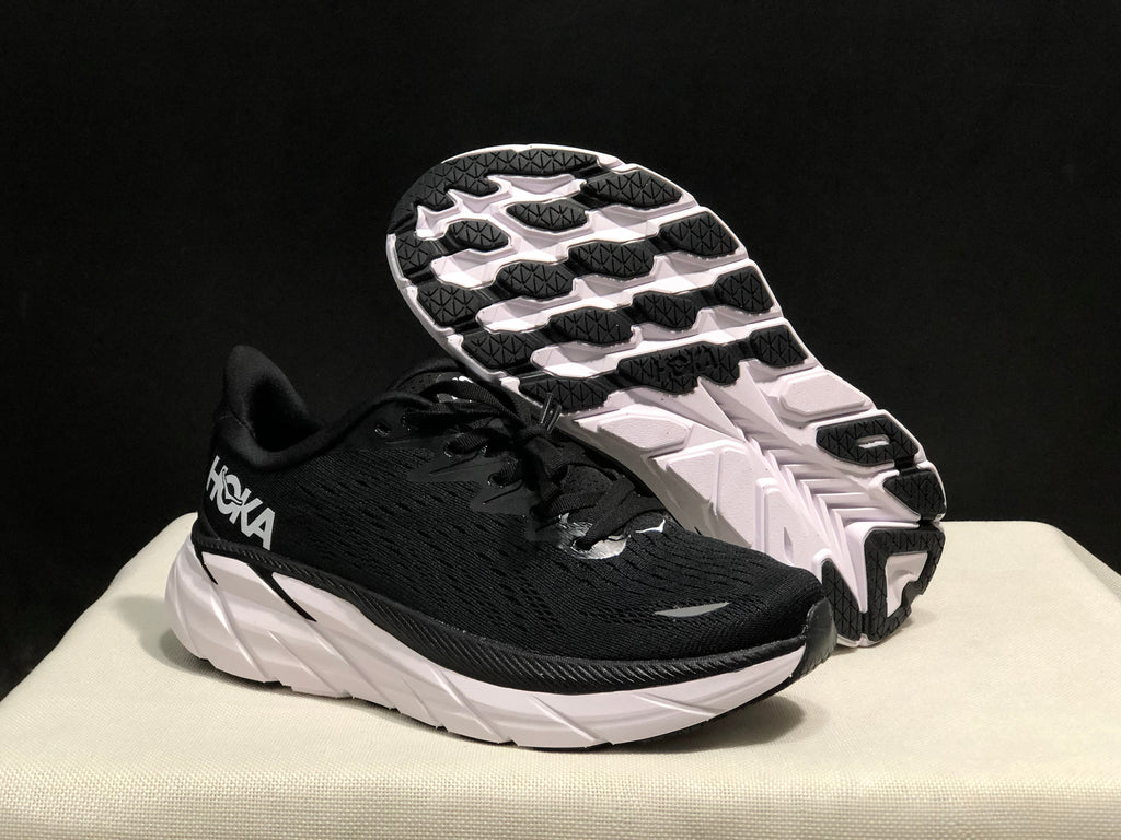 HOKA Clifton 8 Running Shoes, in Black and White - product image from the listing.