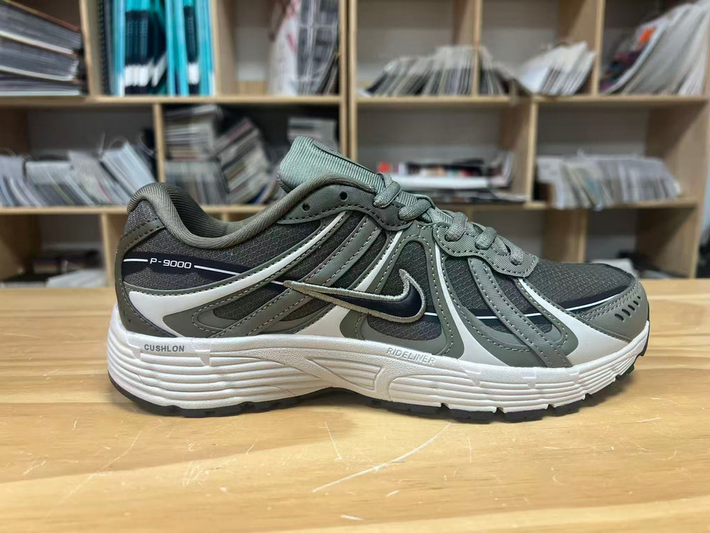 Nike P-9000 Trainers in Charcoal and Grey, IZ4752-300 - product image from the listing.