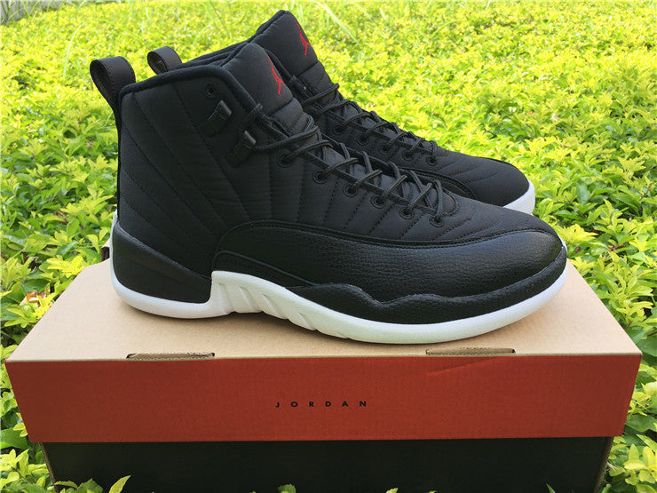 Air Jordan 12 Black Nylon High-Top Sneakers - product image from the listing.