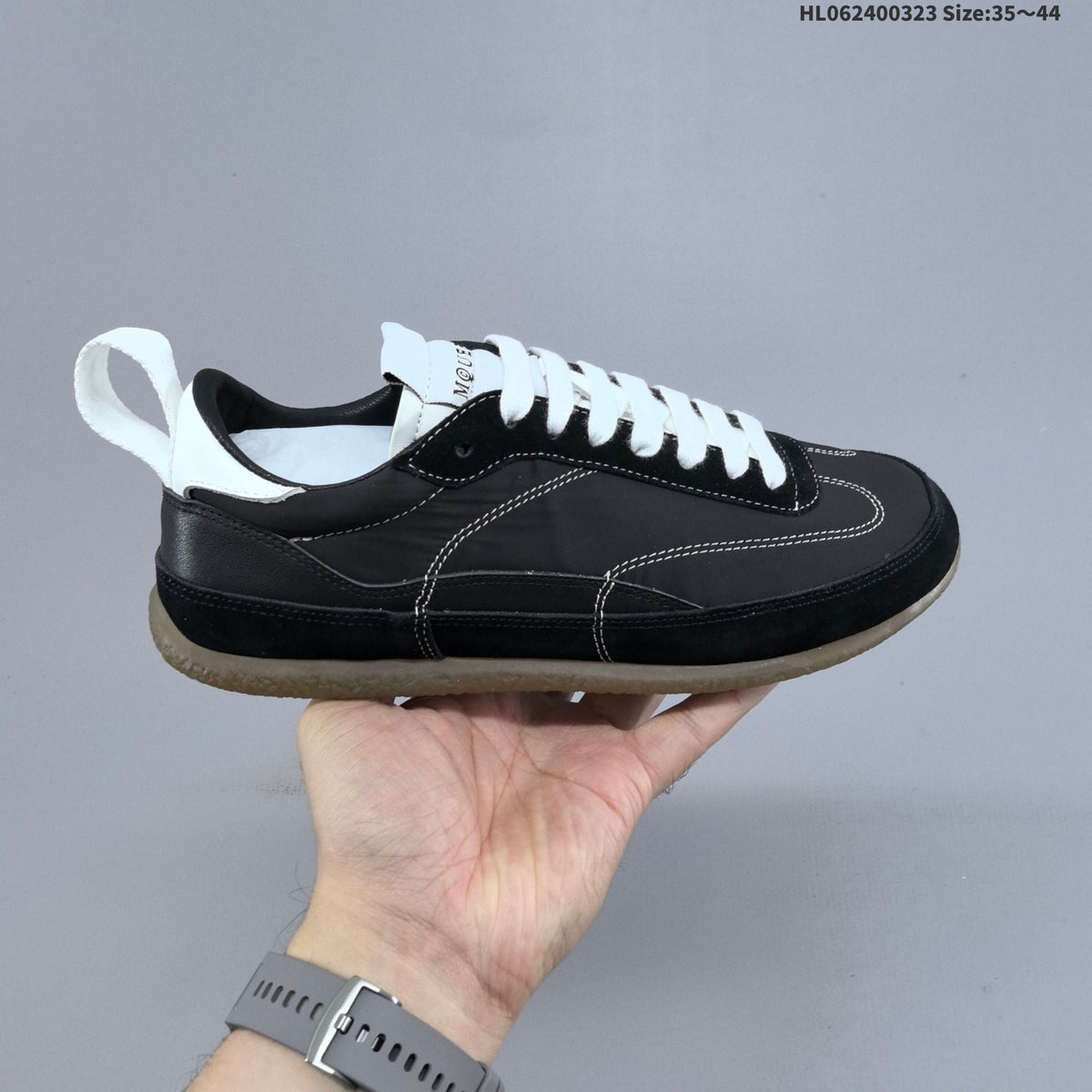 Alexander McQueen EC1 Low-Cut Lace-Up Sneakers - product image from the listing.