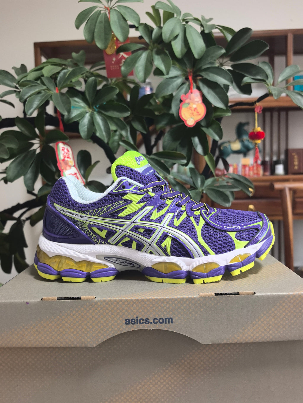 ASICS Gel-Nimbus 16 Sneakers in Purple Volt - product image from the listing.