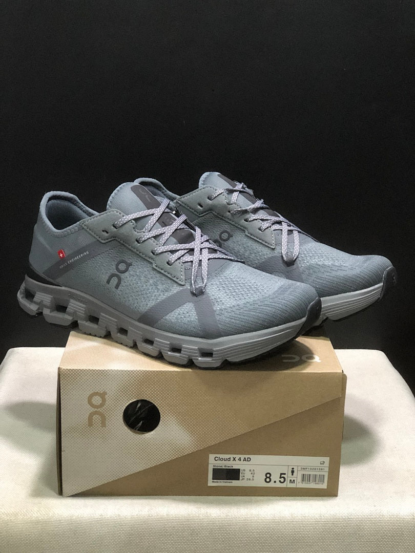 Gray and Black On Cloud X 4 AD Sneakers - product image from the listing.